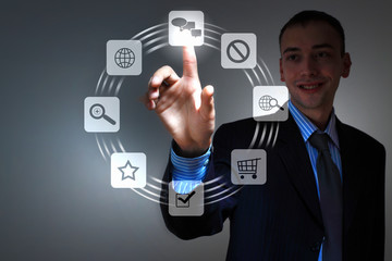 hand pushing on a touch screen