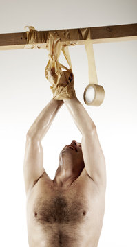 man hanging in studio