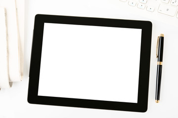 Workplace with blank digital tablet
