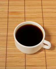 One white coffee cup on the table