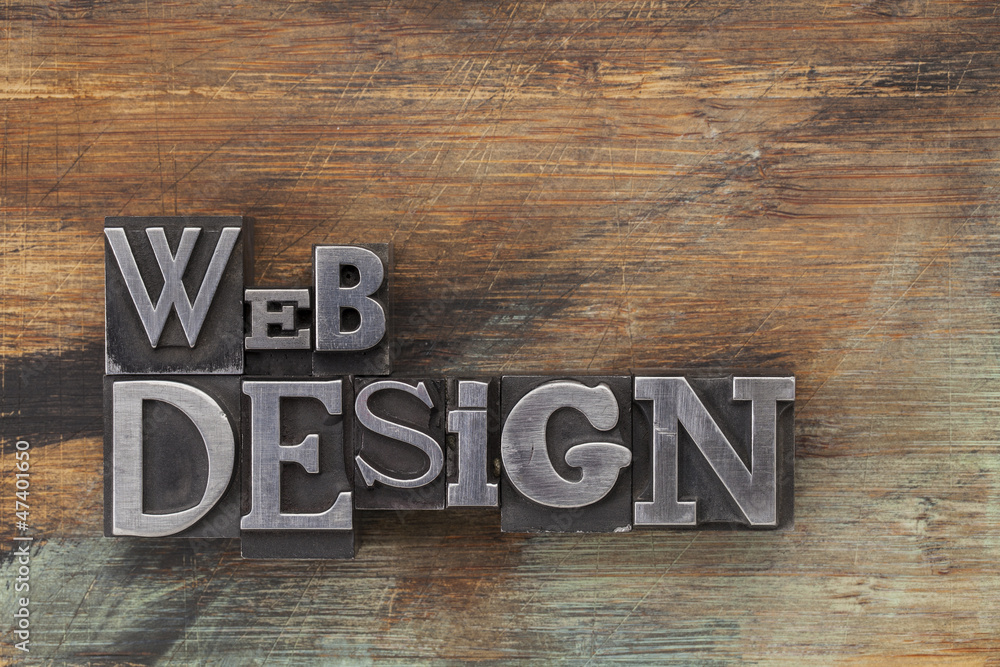 Wall mural web design in metal type blocks