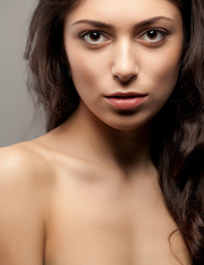 Fototapeta premium Close-up front view portrait of a beauty young female face