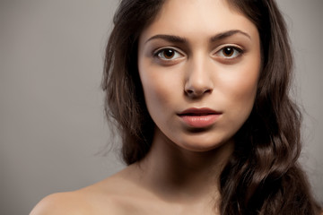 Close-up front view portrait of a beauty young female face