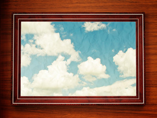 wooden window with blue sky