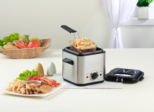 Чем заменить фритюрницу в домашних условиях Fryer Deep Изображения: просматривайте стоковые фотографии, векторные изображени