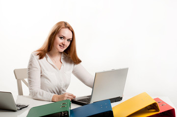 Business woman at a desk with a laptop