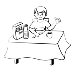 Small boy have a breakfast