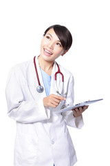 Fototapeta premium doctor woman using pc and look copy space