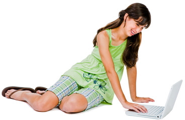Obraz na płótnie Canvas Teenager using a laptop