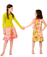 Two girls holding hands