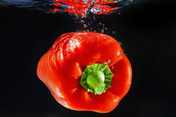 A pepper under water