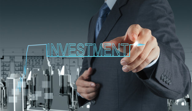 businessman  pointing to investment concept