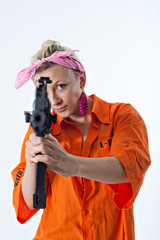 Young woman with automatic rifle