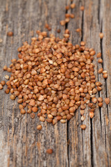 buckwheat on an old wooden surface