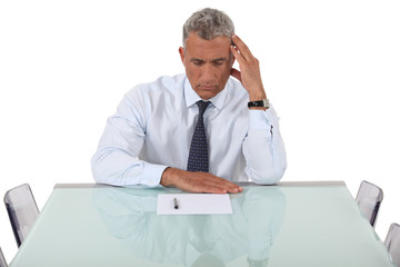 Concentrated man reading a document