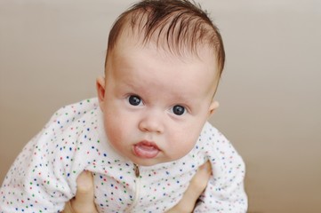 The baby at mother on hands (2,5 months)