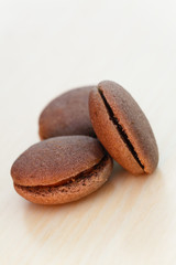 Chocolate marron cookies with black chocolate cream