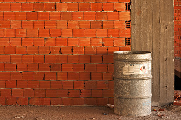 Chemical drum inside construction site