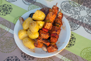 Baked meat and potatoes