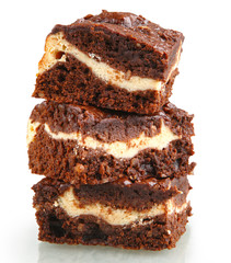 pile of brownies with white and dark chocolate isolated on white