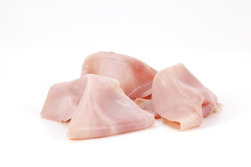 Slices of cooked ham, on white background, isolated