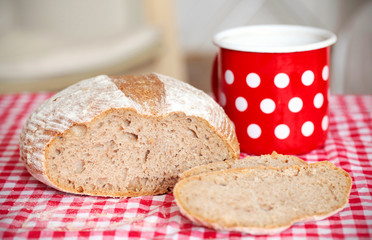 Sliced spelt flour bread at breakfast, retro