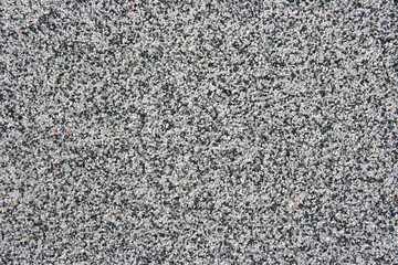 Obraz premium The wall with very small stones.