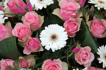 Pink roses, white gerberas in bridal arrangement