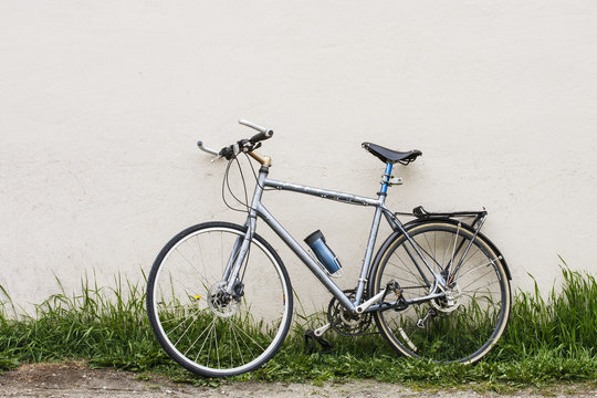 Old Bike Against Stucco Wall