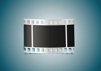 Realistic film reel on blue background