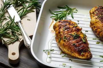 Close-up of roast chicken with rosemary