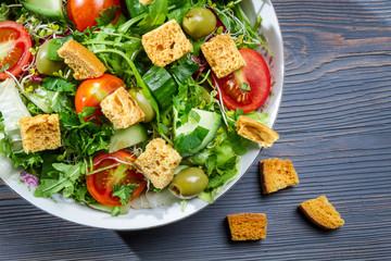 Closeup of healthy Caesar salad with croutons