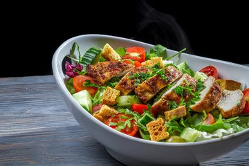 Healthy salad made ​​with vegetables and chicken