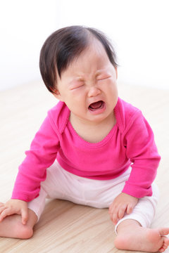portrait of crying baby girl