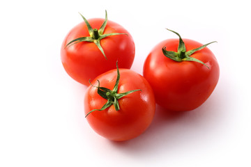 Tomatoes on the white background