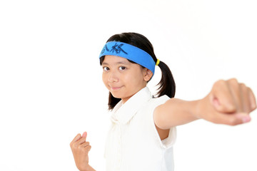 ガッツポーズをする受験生の女の子