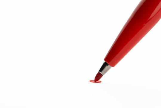Red highlighter pen isolated on white background