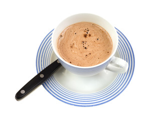 Cup and saucer of hot chocolate with spoon