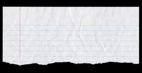 Torn white lined paper page top isolated on black.