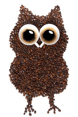 Owl made ​​of coffee beans, a cup of coffee with two eyes