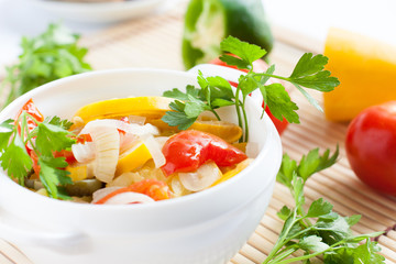 stewed red peppers and yellow squash