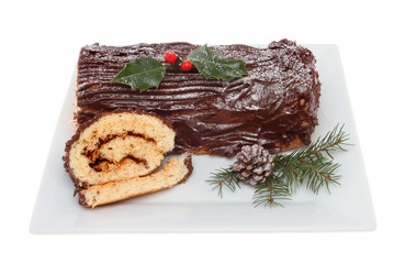 Chocolate yule log on a plate