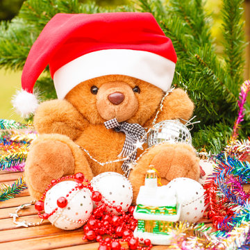 Christmas expectations concept - teddy bear with Christmas decor