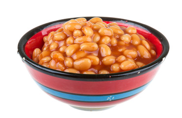 Marinated haricot beans in tomato sauce with shallots on a plate