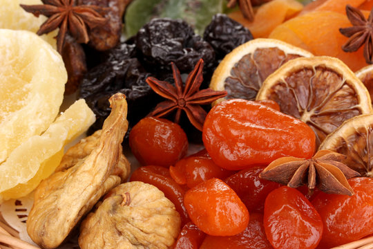Dried fruits with cinnamon and anise stars close-up