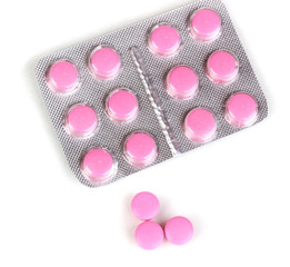 Pills packed in blister isolated on white
