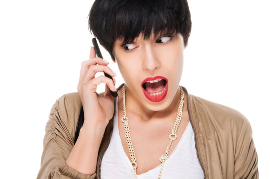 Beautiful Girl With Cell Phone Looking Shocked