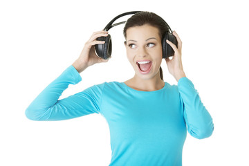 Naklejka premium Beautiful woman with headphones