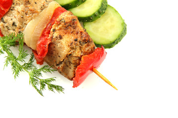 tasty grilled meat and vegetables on skewer, isoalted on white