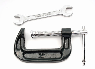 Adjusment clamp and wrench